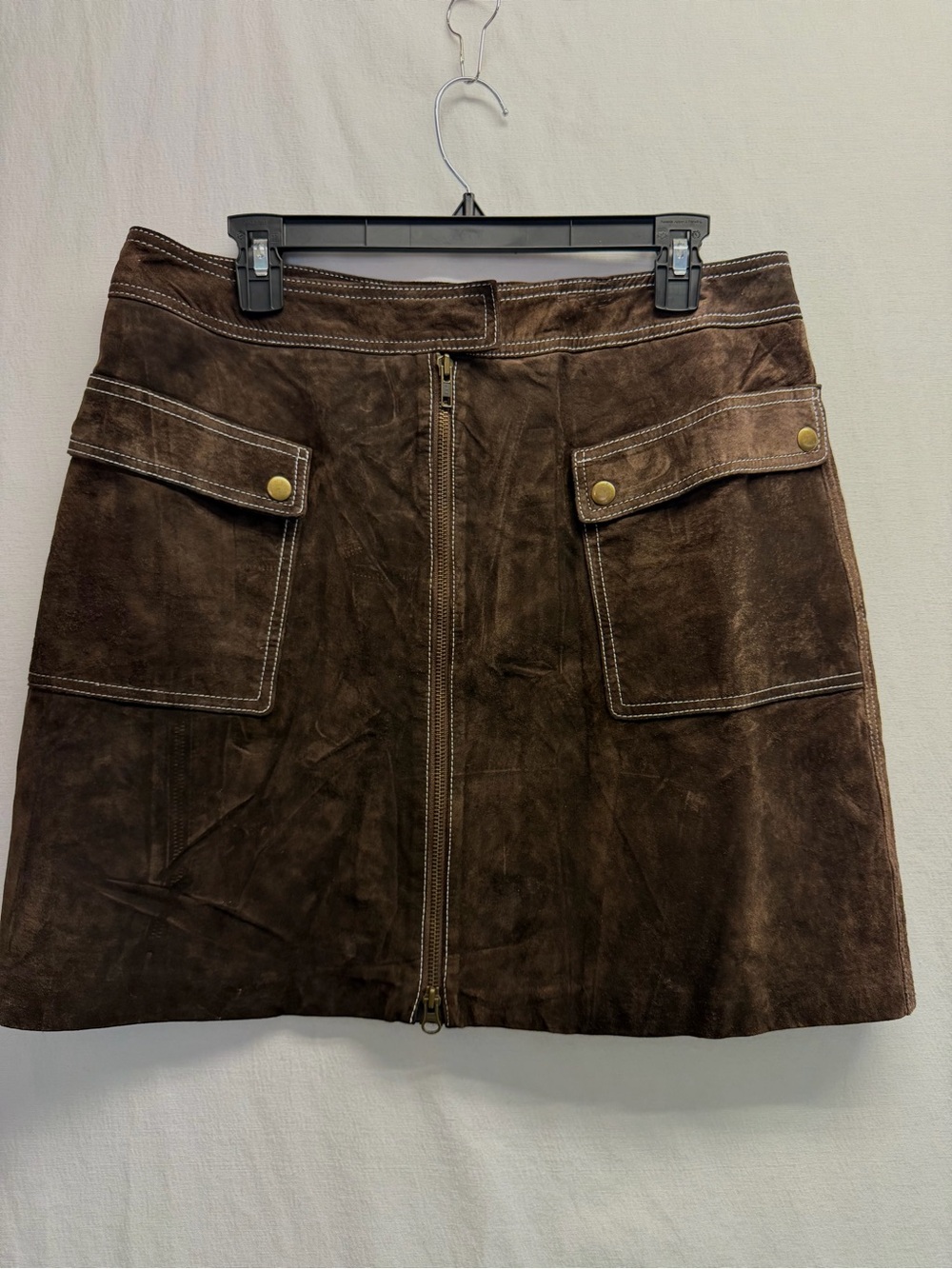 Brown leather skirt Zipper front w/ pockets 
Size 12